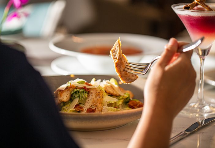 woman eating at the table,Young Asia woman eating spaghetti at restaurant